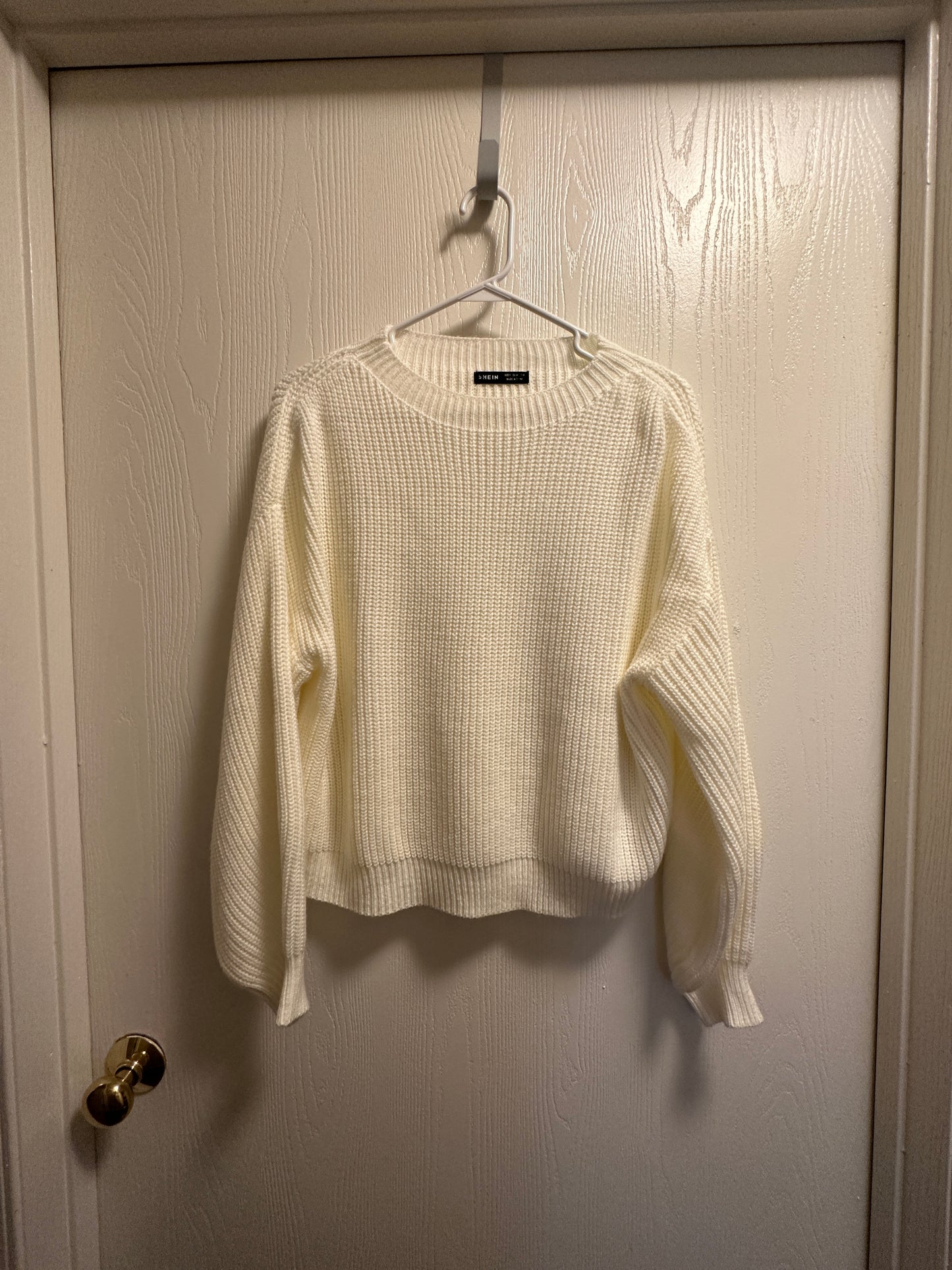 cream sweater