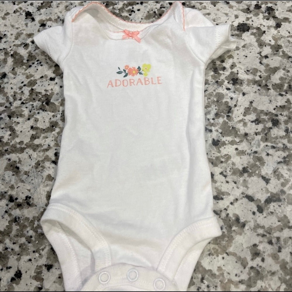 *9 newborn onesies